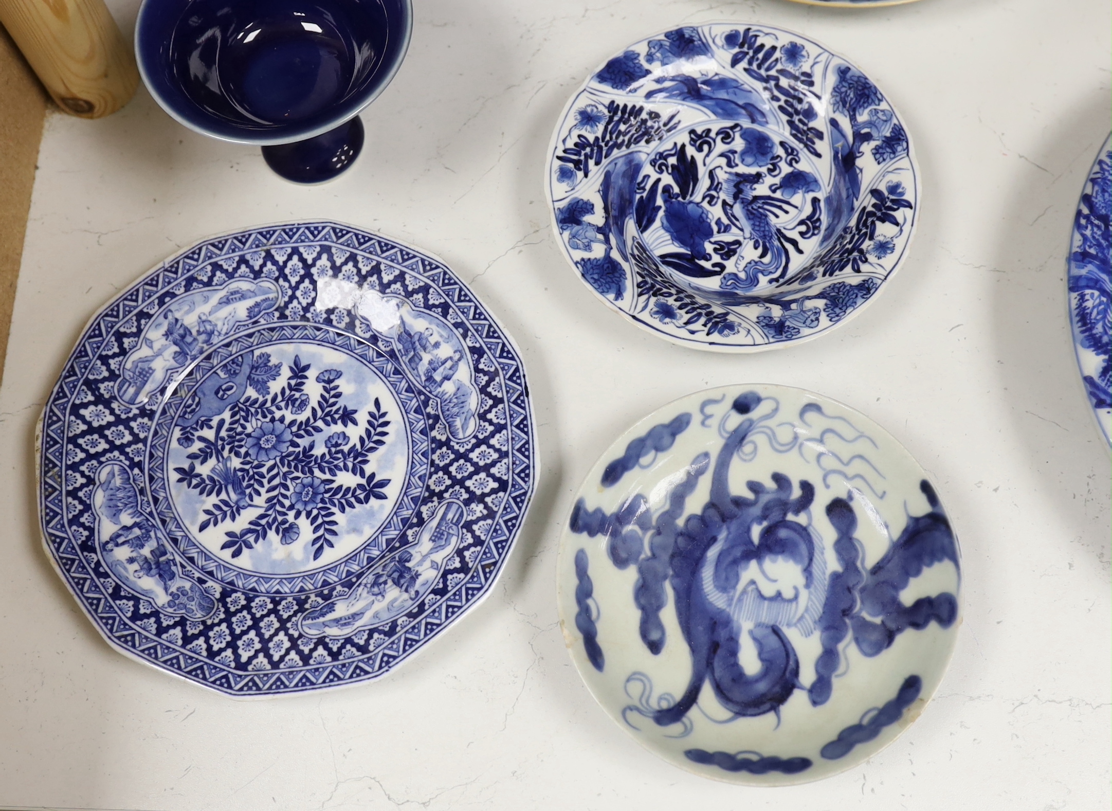 A Chinese jar, double gourd vase and pedestal dish, tallest 16cm, together with an 18th century Chinese export blue and white dish and two others, largest 26cm, an 18th/19th century Chinese bowl and five plates, bowl 10c